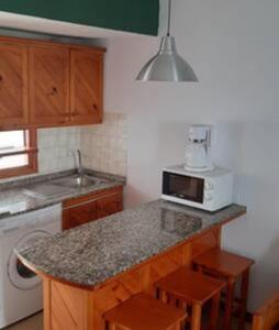 Kuchyňa alebo kuchynka v ubytovaní Casa Teresa. Duplex en Maspalomas