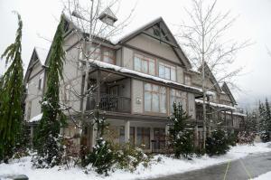 a large house with snow on the roof at Twin Peaks Resort by Whistler Vacation Club in Whistler