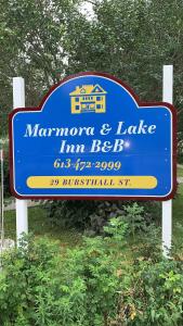 a sign for a marron and lake im beeb at Marmora and Lake Inn in Marmora