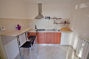 Kuchyňa alebo kuchynka v ubytovaní Guesthouse Totićevi