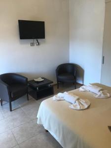 TV a/nebo společenská místnost v ubytování Hostería Tantanakuna