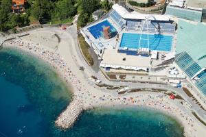 an overhead view of a beach with a swimming pool at Guesthouse Totićevi in Rijeka