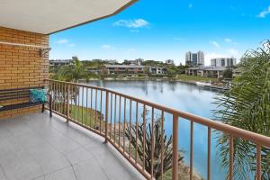 a balcony with a view of a river at CANAL7-ON THE MOOLOOLABA CANAL! in Mooloolaba