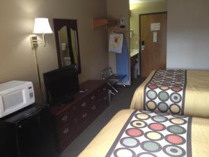 Voodi või voodid majutusasutuse Super 8 by Wyndham Olney toas