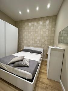 A bed or beds in a room at O Vascetiello