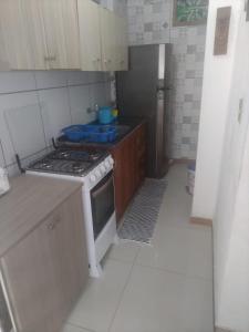 Køkken eller tekøkken på Casa Temporada - 2 Quartos + 5 billeder