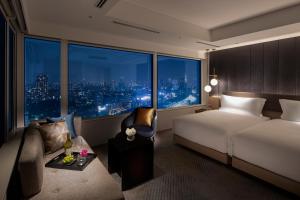 מיטה או מיטות בחדר ב-The Strings by InterContinental, Tokyo by IHG