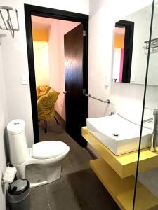 a bathroom with a toilet and a sink at Apartment in the touristic heart of Mexico City in Mexico City