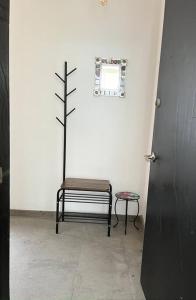 a room with a bench and a tree on the wall at Apartment in the touristic heart of Mexico City in Mexico City