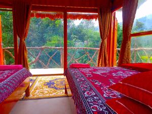 A bed or beds in a room at ChienDe Homestay