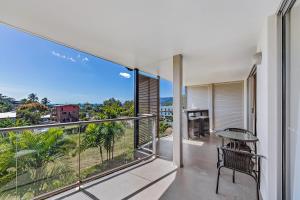 Apartamento con balcón con vistas al océano. en Candlelight - Airlie Beach en Airlie Beach