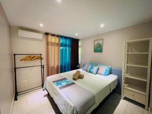 Voodi või voodid majutusasutuse Tahiti beach house toas