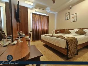 Postel nebo postele na pokoji v ubytování Hotel ESSENCE
