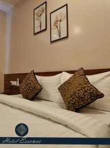 Postel nebo postele na pokoji v ubytování Hotel ESSENCE