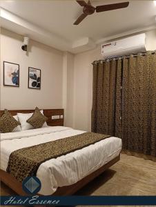 Postel nebo postele na pokoji v ubytování Hotel ESSENCE