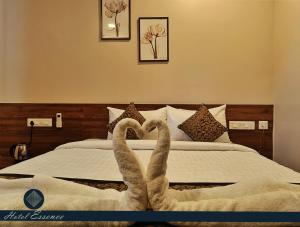 Postel nebo postele na pokoji v ubytování Hotel ESSENCE