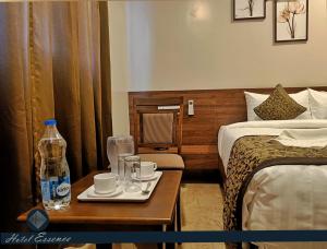Postel nebo postele na pokoji v ubytování Hotel ESSENCE