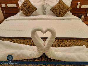Postel nebo postele na pokoji v ubytování Hotel ESSENCE