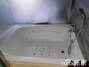 Koupelna v ubytování Cube Hotel + 13 fotografií