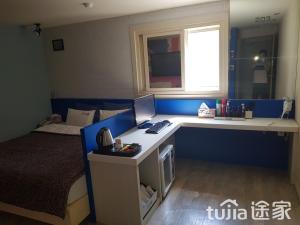 Postel nebo postele na pokoji v ubytování Cube Hotel