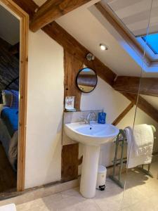 a bathroom with a sink in a room at The Hideaway in Ripponden