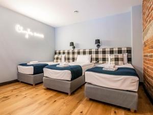 Posteľ alebo postele v izbe v ubytovaní Salio Equisport Resort