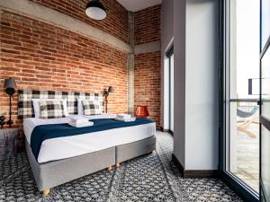 Posteľ alebo postele v izbe v ubytovaní Salio Equisport Resort