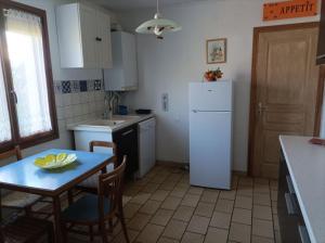 Kuchyňa alebo kuchynka v ubytovaní Chez Nath