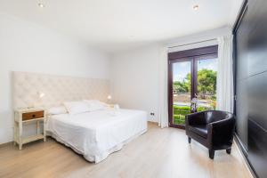 Postel nebo postele na pokoji v ubytování Villa Casa Bon Sol + 21 fotografií