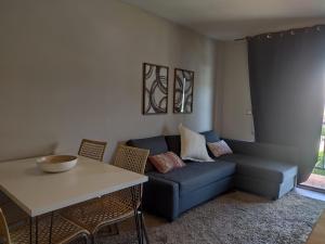 Posezení v ubytování Apartamento D´Ousseau
