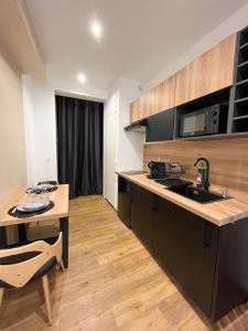 Kuchyňa alebo kuchynka v ubytovaní Suite cocooning & spa