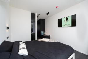 Voodi või voodid majutusasutuse Georges & Madeleine Apartments toas