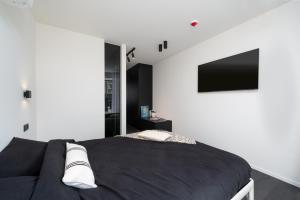 Voodi või voodid majutusasutuse Georges & Madeleine Apartments toas