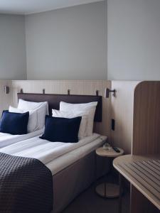 Postel nebo postele na pokoji v ubytování Quality Hotel Arlanda XPO