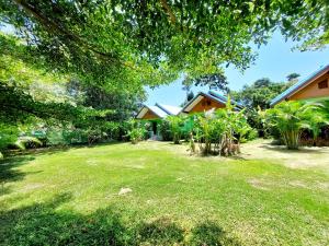 Zahrada ubytování Papaya Cottage Koh Chang + 37 fotografií