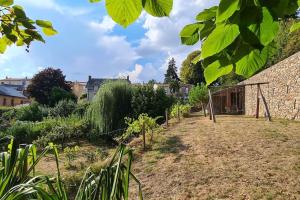 Vonkajšia záhrada v ubytovaní Les Hauts de St Jacques maison d'exception 300m2, jardin arboré 2000m2