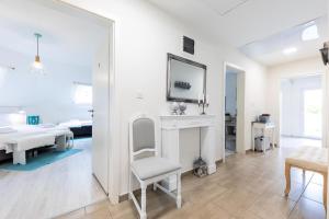 Postel nebo postele na pokoji v ubytování Magnólia