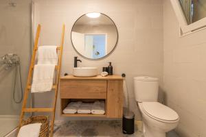 Koupelna v ubytování Bacom Apartment