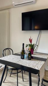 Televízia a/alebo spoločenská miestnosť v ubytovaní ONLY THE BEST 5 La tua Suite tra Venezia e Treviso