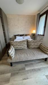 A bed or beds in a room at ONLY THE BEST 5 tra Venezia e Treviso