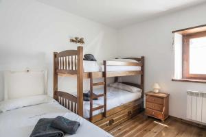 Posteľ alebo postele v izbe v ubytovaní Aiguamoig by SeaMount Rentals