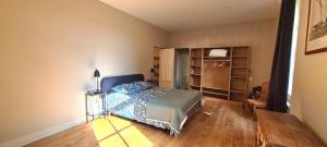 Posteľ alebo postele v izbe v ubytovaní Les Hauts de St Jacques maison d'exception 300m2, jardin arboré 2000m2