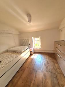Posteľ alebo postele v izbe v ubytovaní Les Hauts de St Jacques maison d'exception 300m2, jardin arboré 2000m2