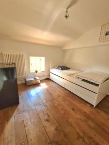 Posteľ alebo postele v izbe v ubytovaní Les Hauts de St Jacques maison d'exception 300m2, jardin arboré 2000m2