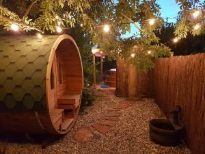 Vonkajšia záhrada v ubytovaní Gîte avec spa et sauna Aux champs des Amours