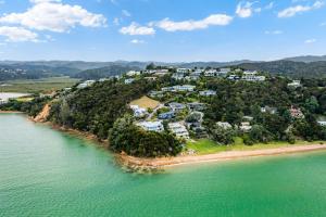 an aerial view of a resort on a island in the water at Bayview Corner Suite Unit 2 - Paihia Unit in Paihia