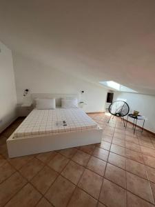 Postel nebo postele na pokoji v ubytování B-Guest House