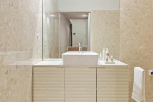 Ein Badezimmer in der Unterkunft 108MM House