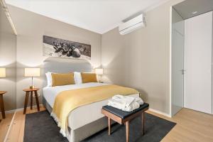 Ein Bett oder Betten in einem Zimmer der Unterkunft 108MM House