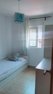 Łóżko lub łóżka w pokoju w obiekcie Casa adosada 3 habitaciones con piscina comunitaria